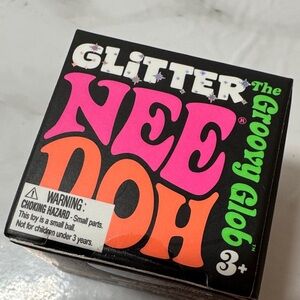 Glitter NeeDoh. New. Color unknown! Sold as-is.
